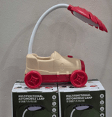 Kırmızı -krem sevimli antika araba görünümlü masa lambası, kalemlik, telefon tutacağı